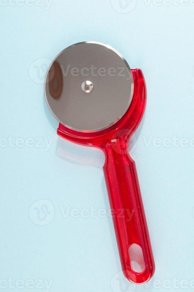 Pizza cutter close up photo