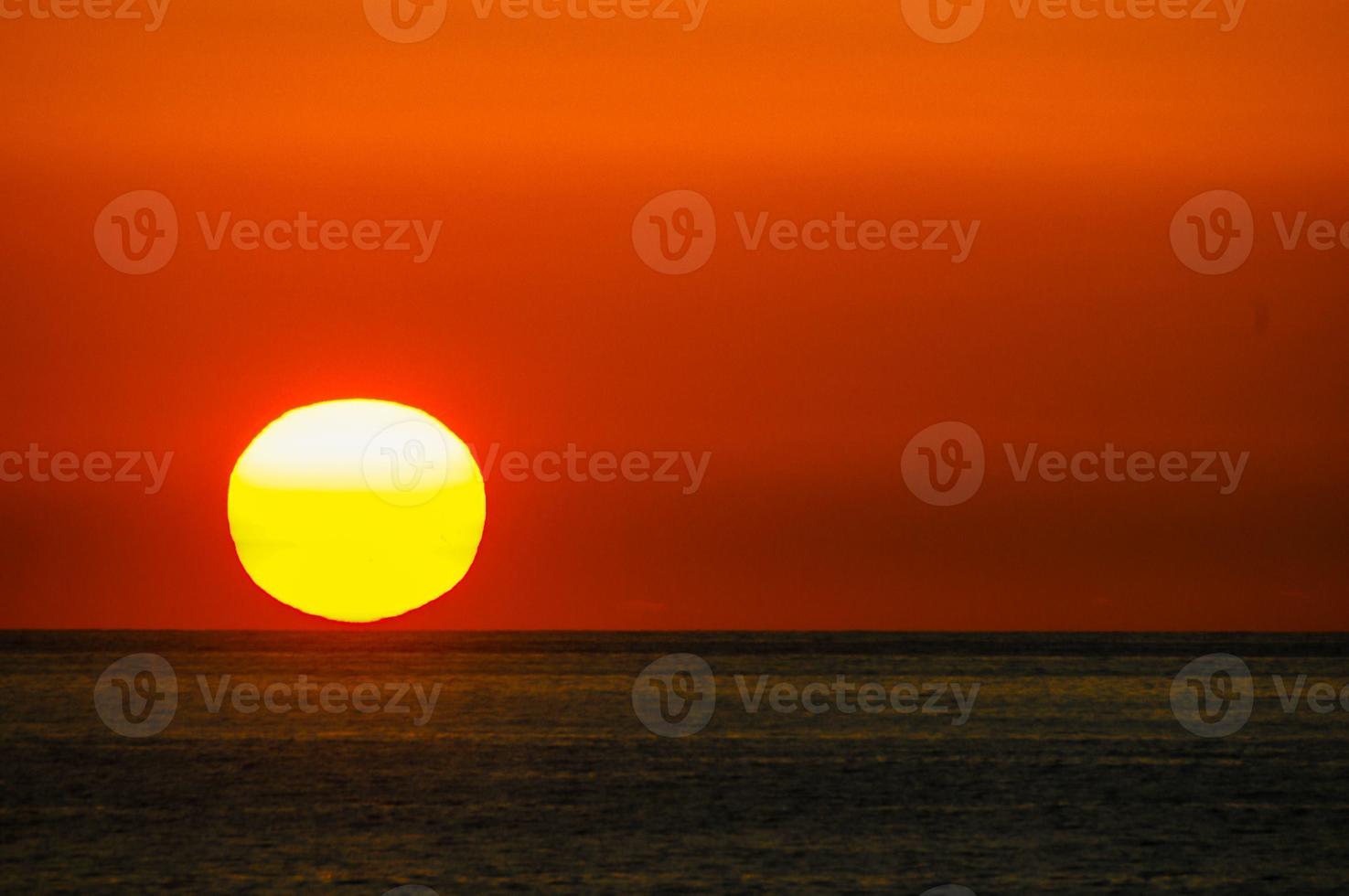 Sunset over the sea photo