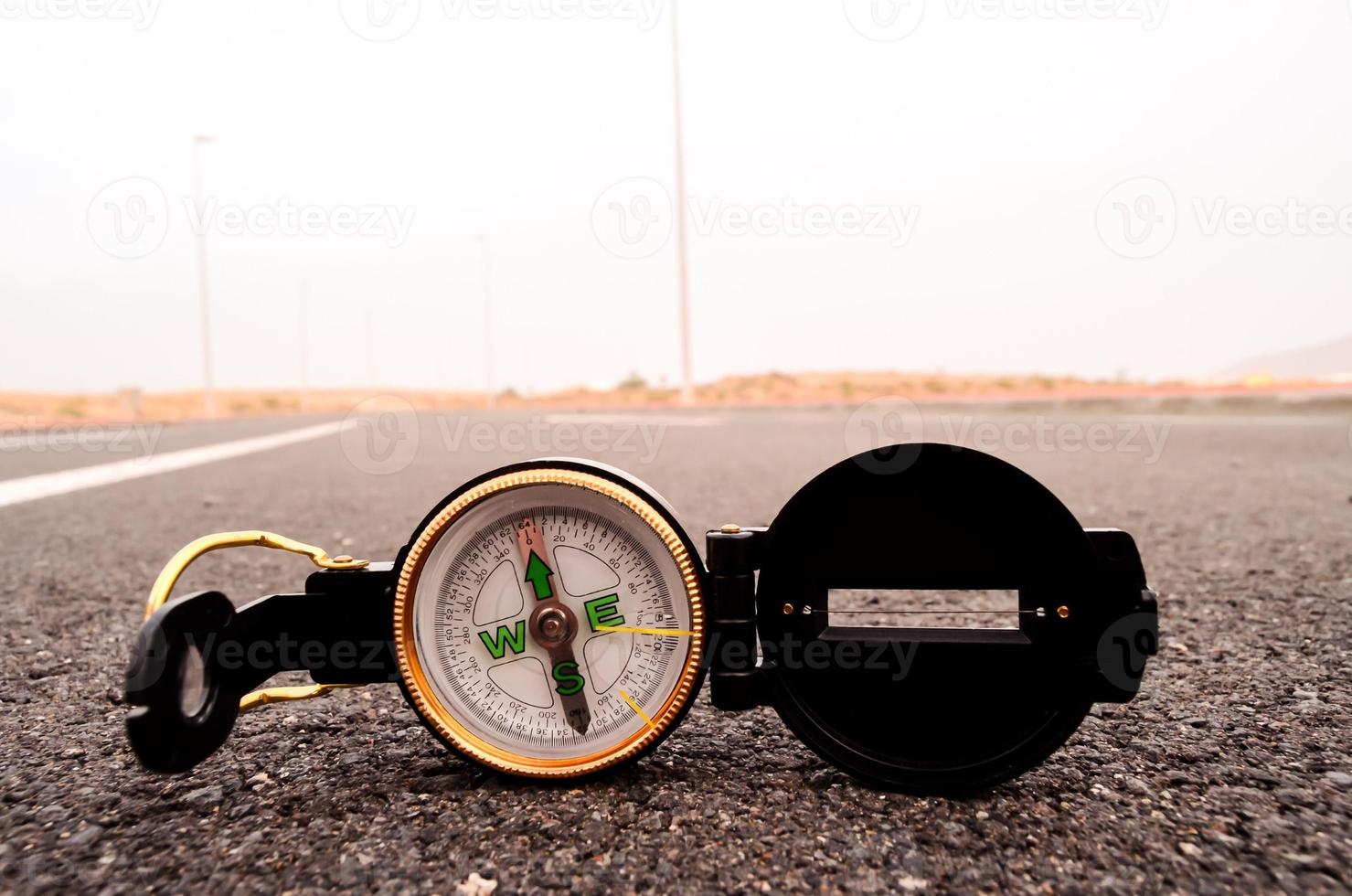 Compass on the ground photo
