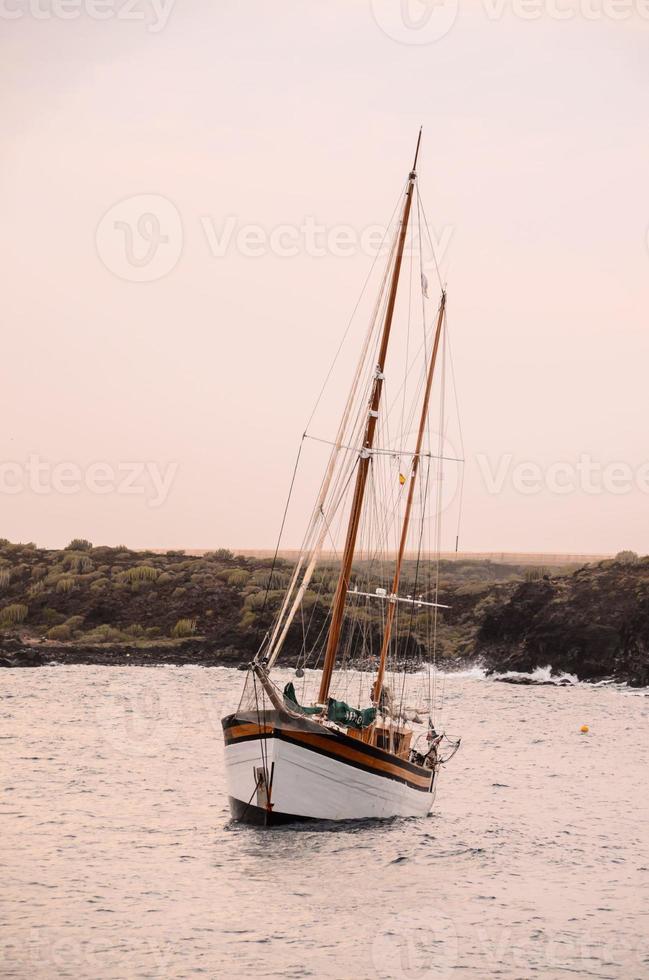 Boat on the harbor photo