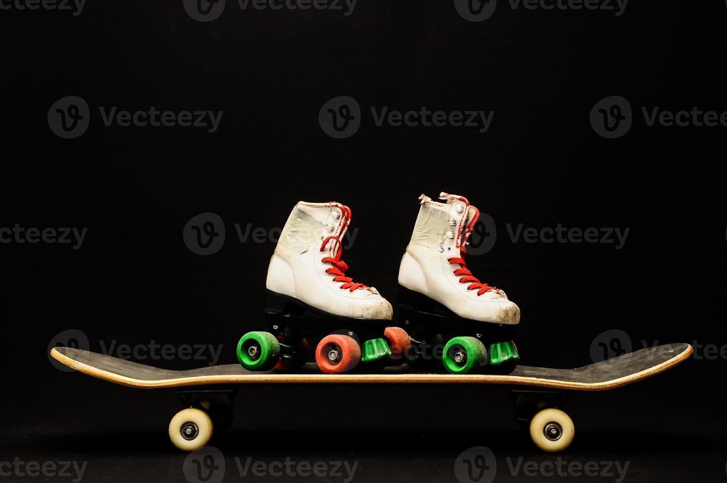 Skateboard on black background photo