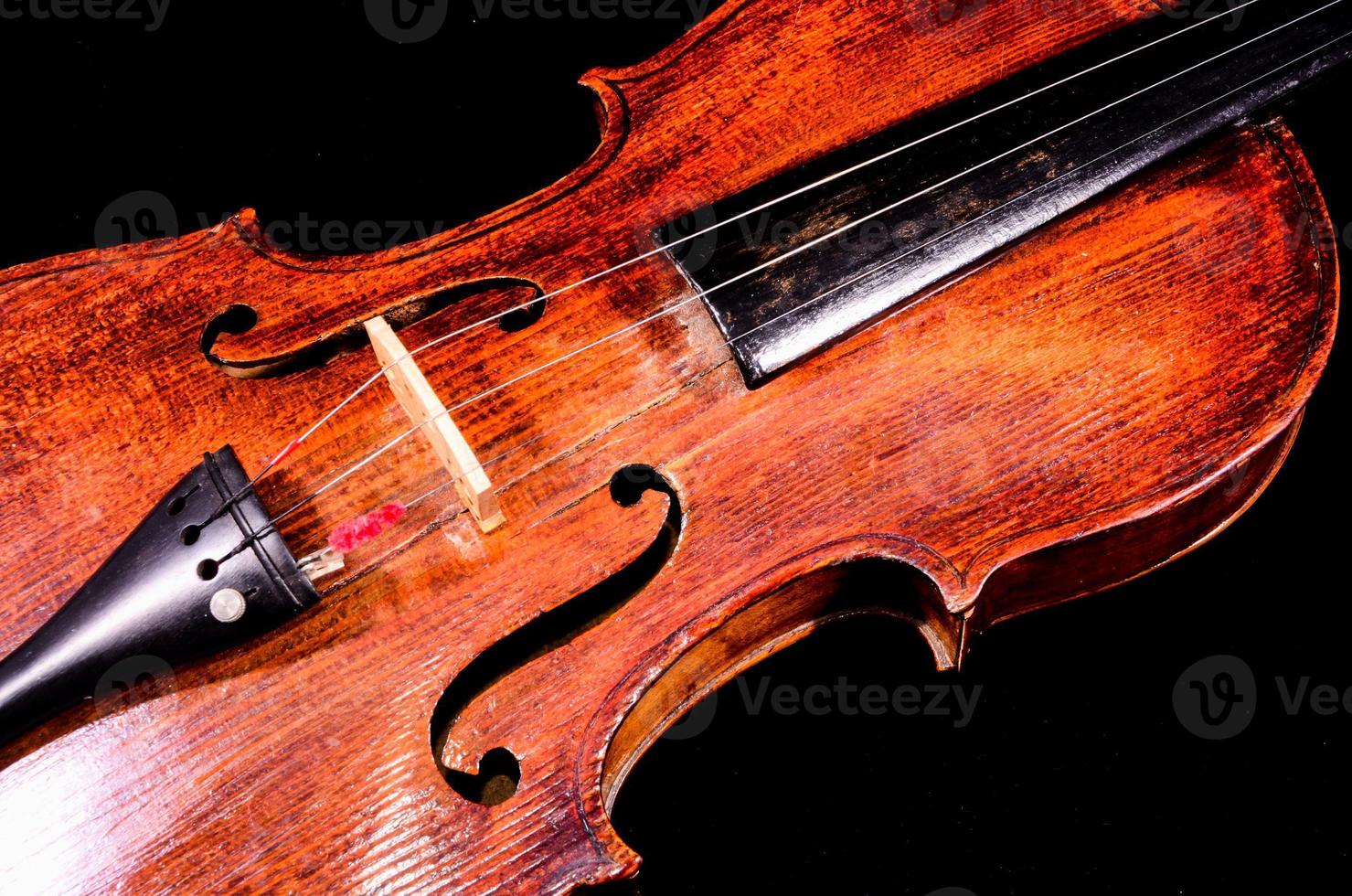 Violin on black background photo