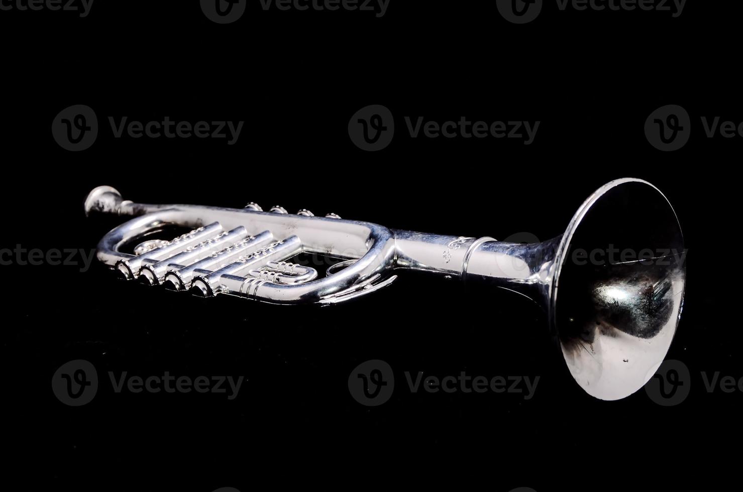 Trumpet on black background photo