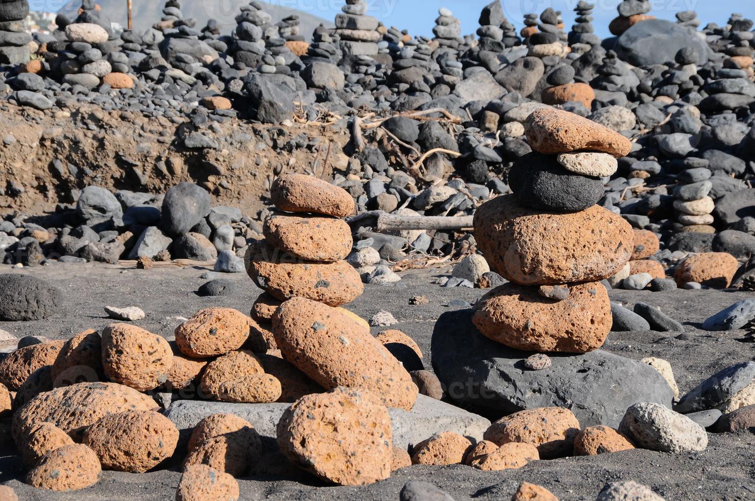 Stacked rocks on the beach photo