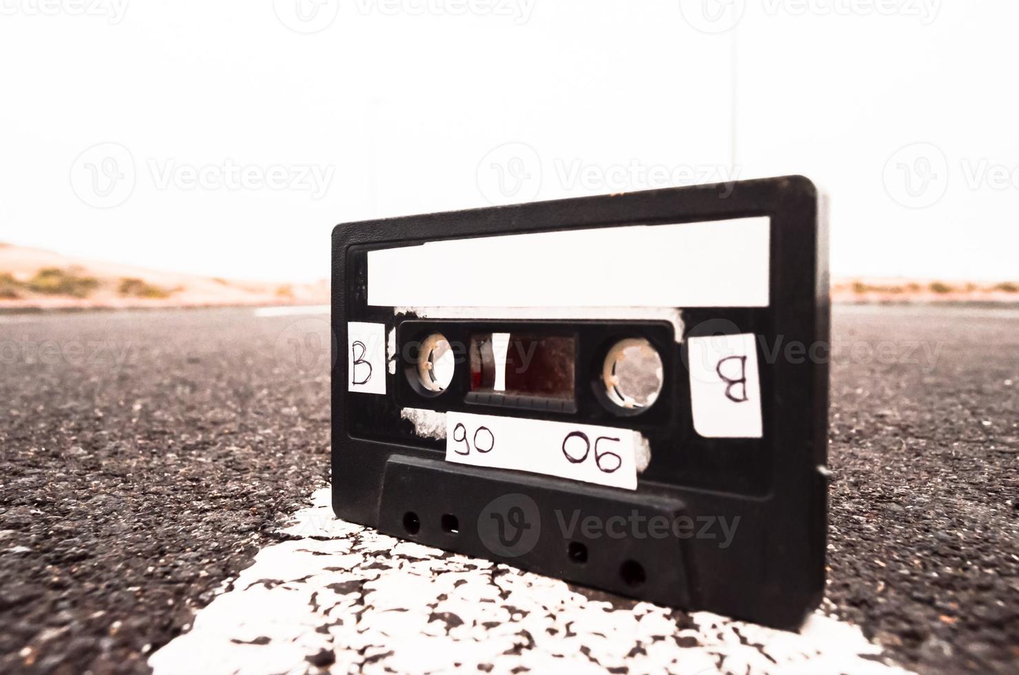 Old casette tape on the road photo