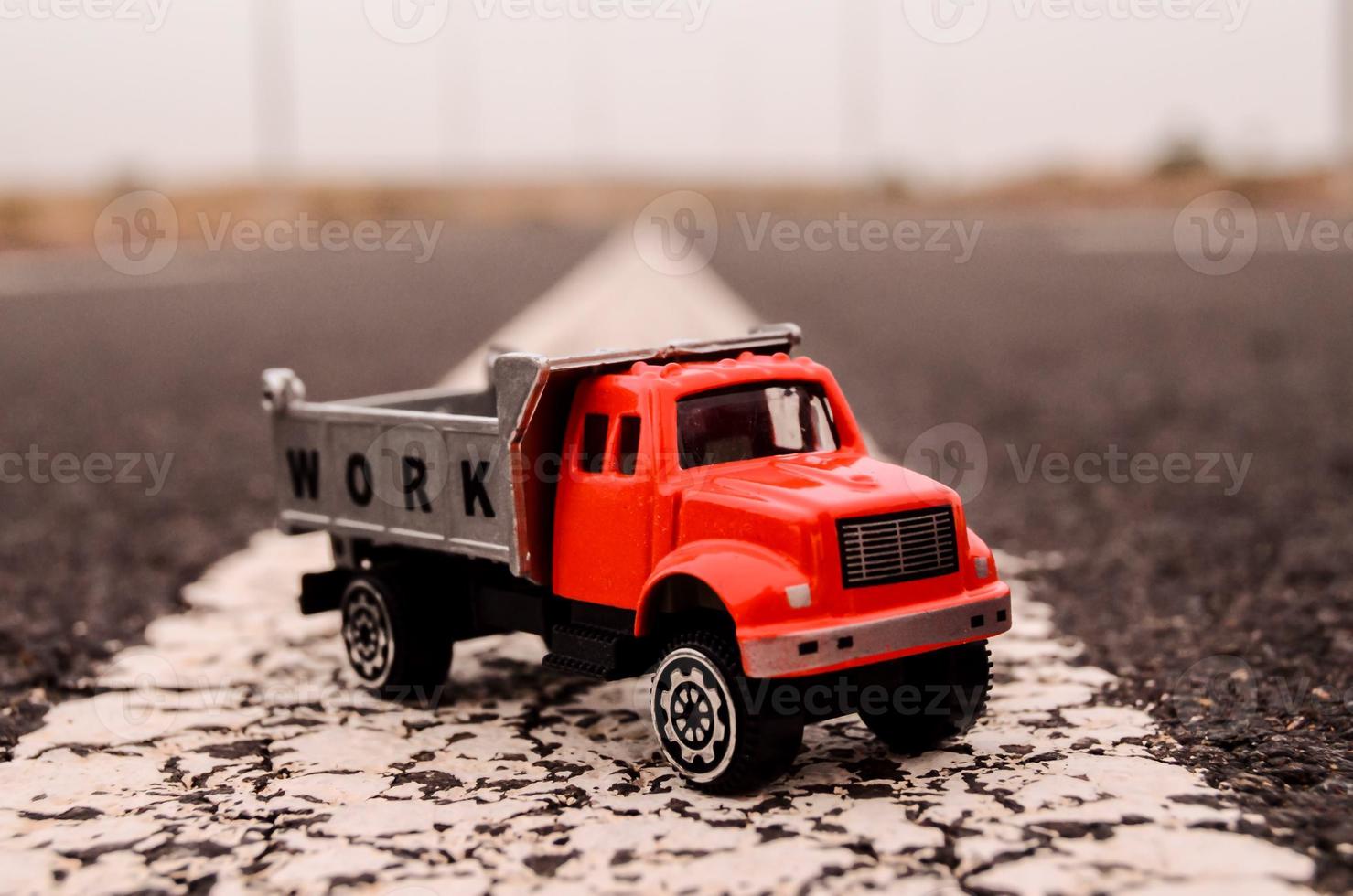 Toy truck on the road photo