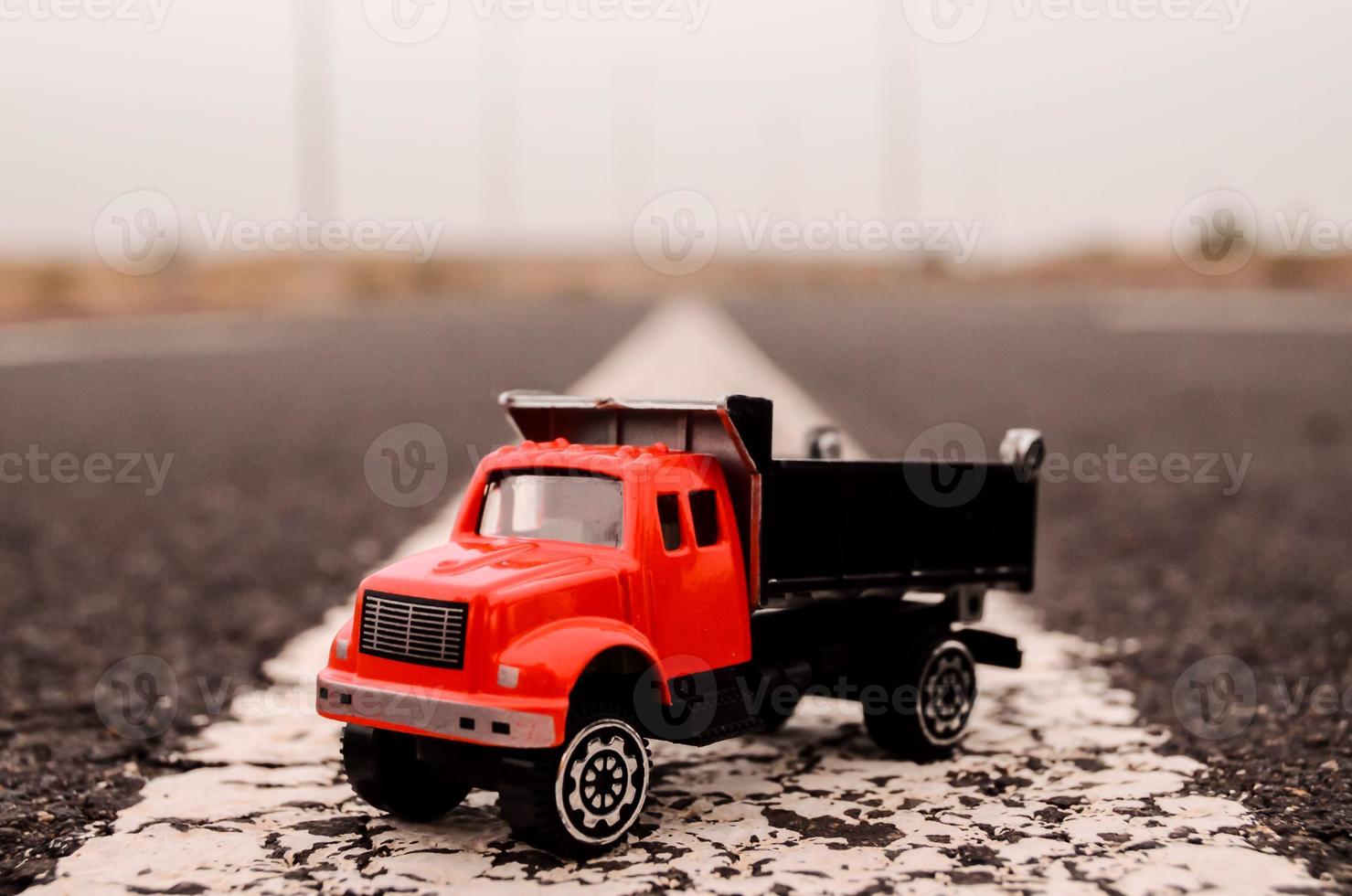 Toy truck on the road photo