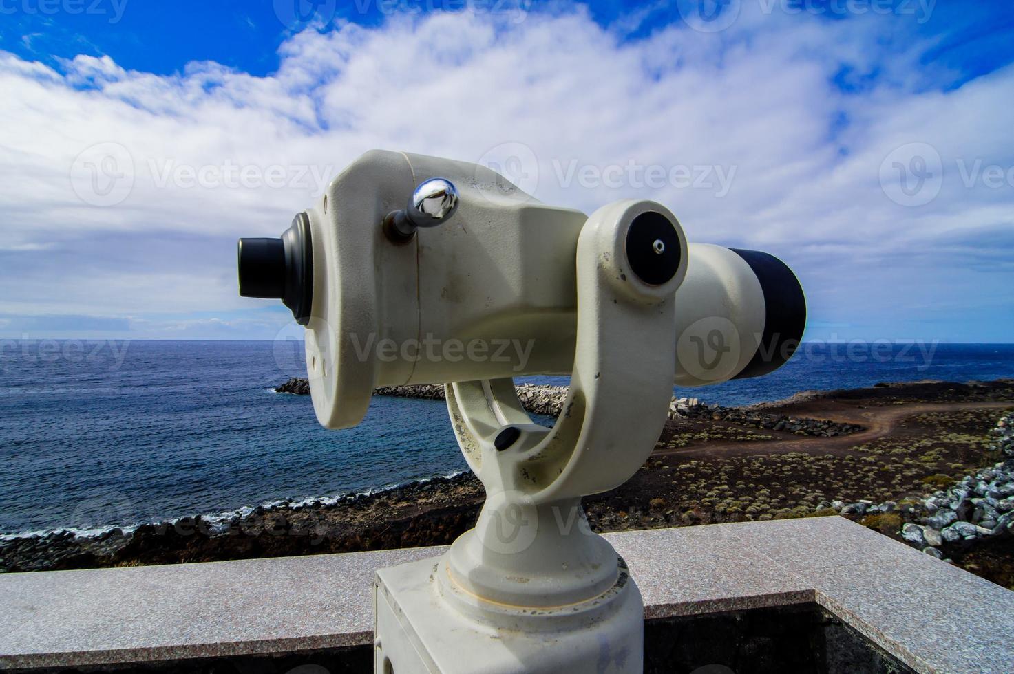 Public binoculars bu the ocean photo