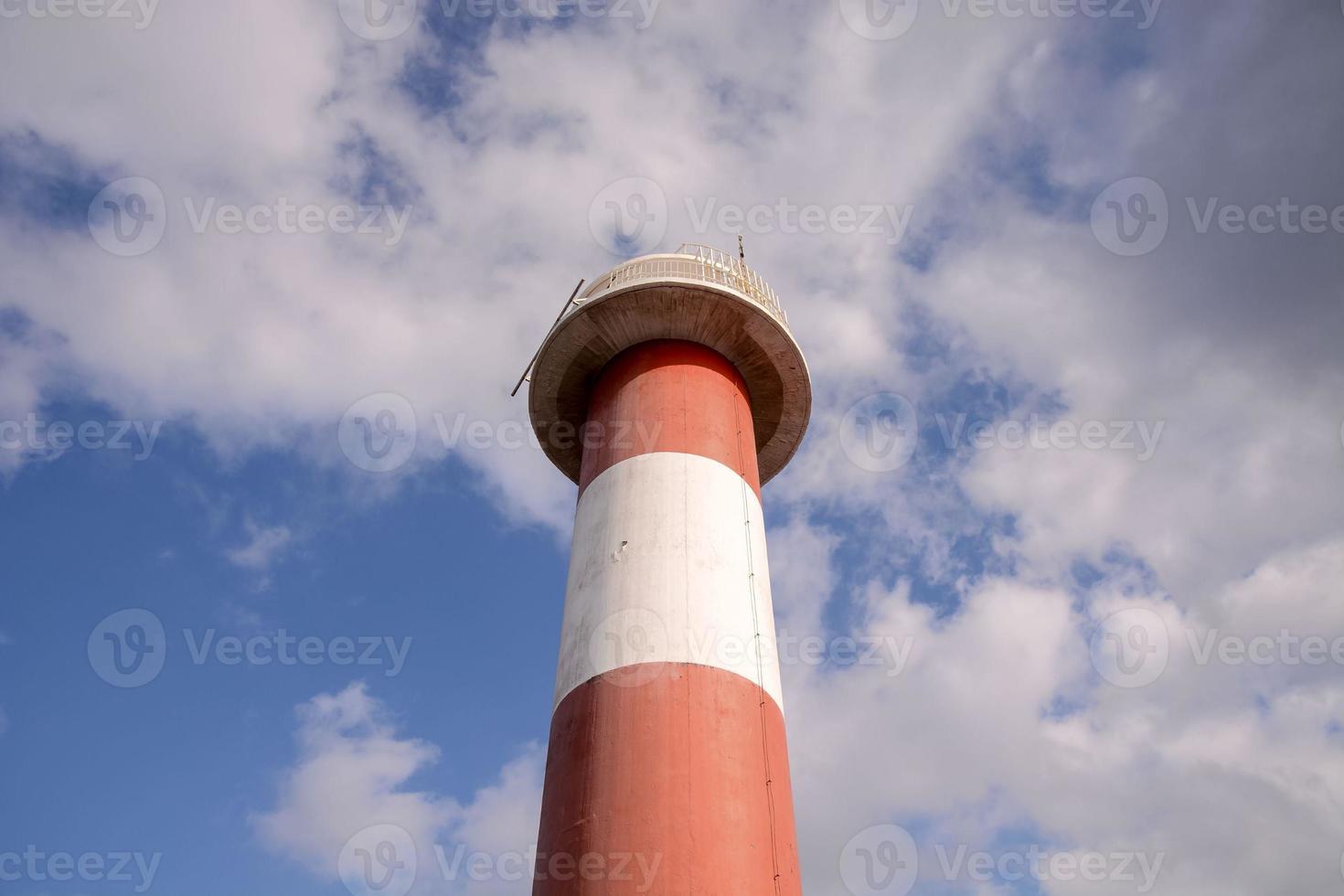 Lighthouse by the sea photo