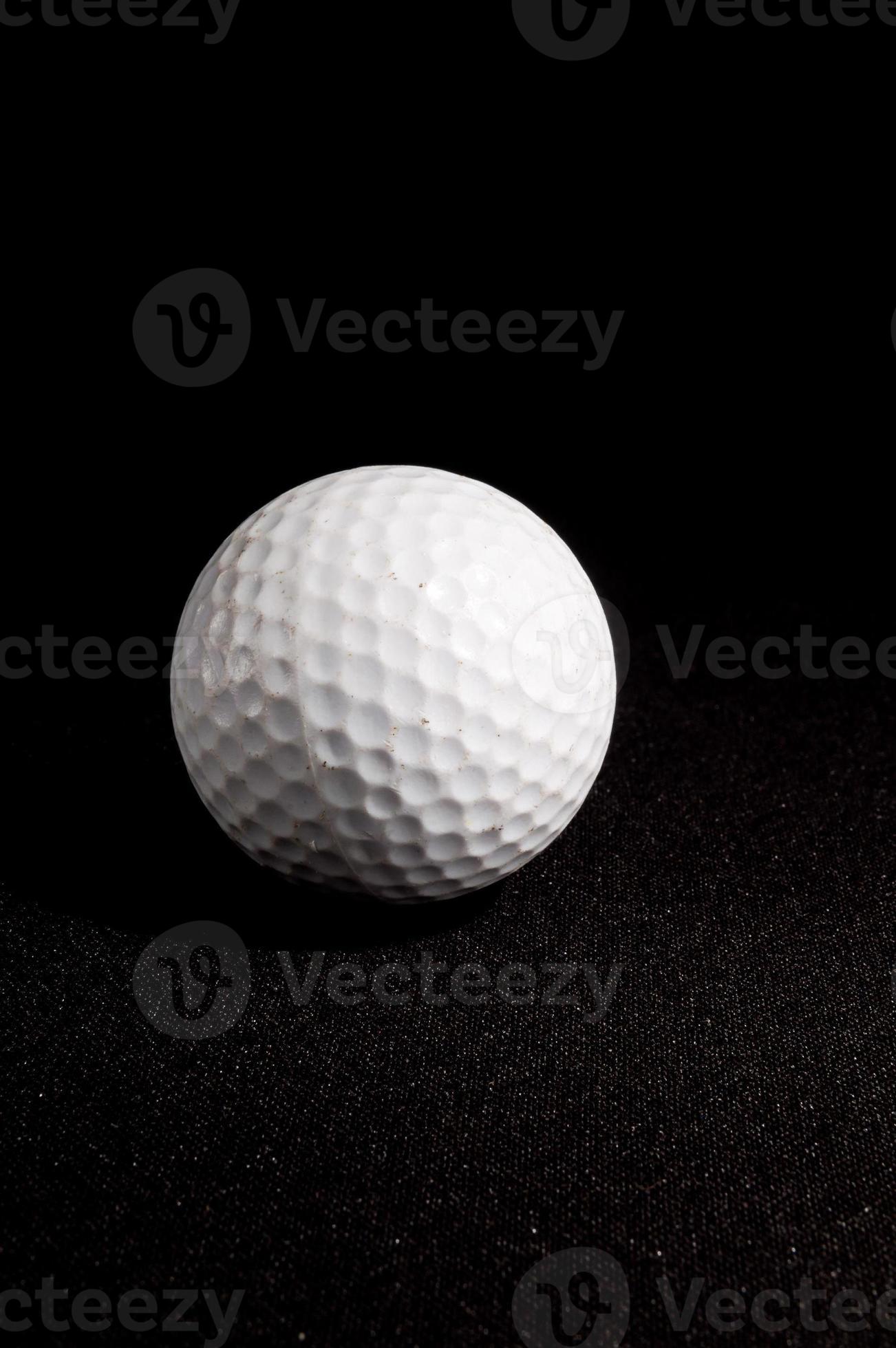 Golf ball on black background 18858810 Stock Photo at Vecteezy