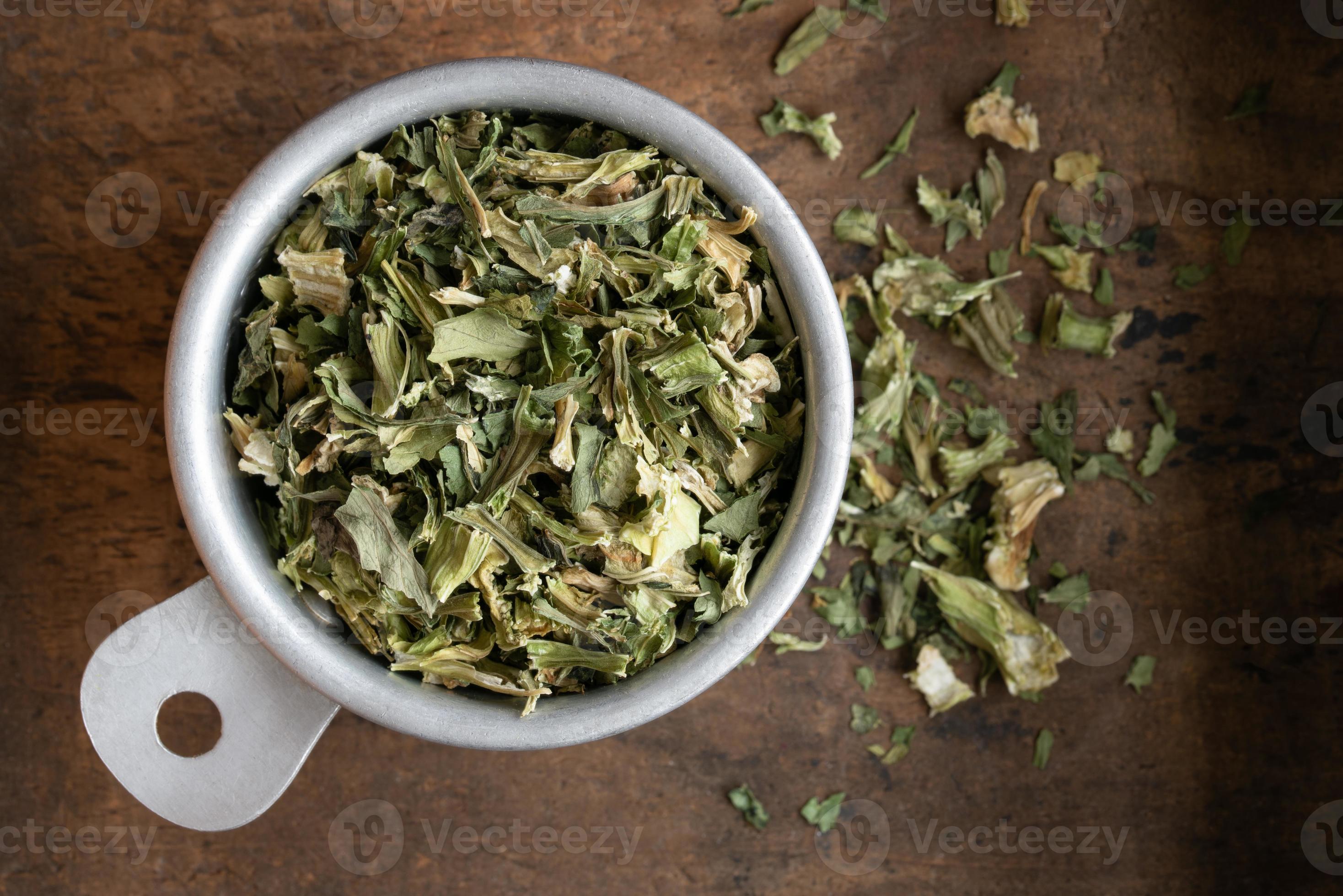 Dried Celery Flakes in a Measuring Cup 18882998 Stock Photo at Vecteezy