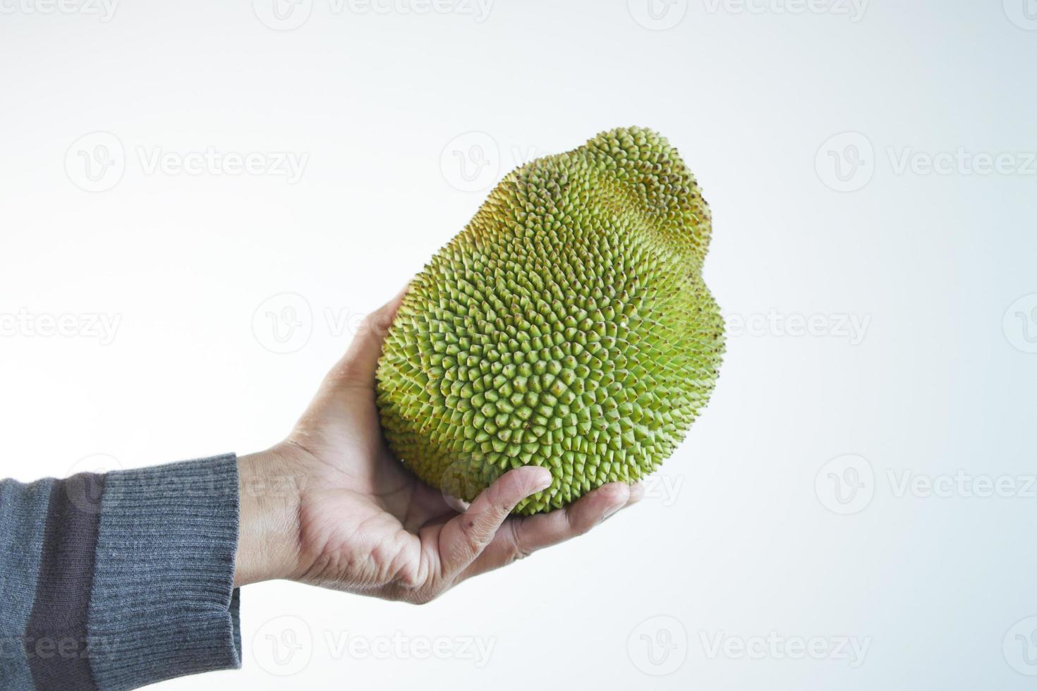 men holding a jackfruits on white background photo