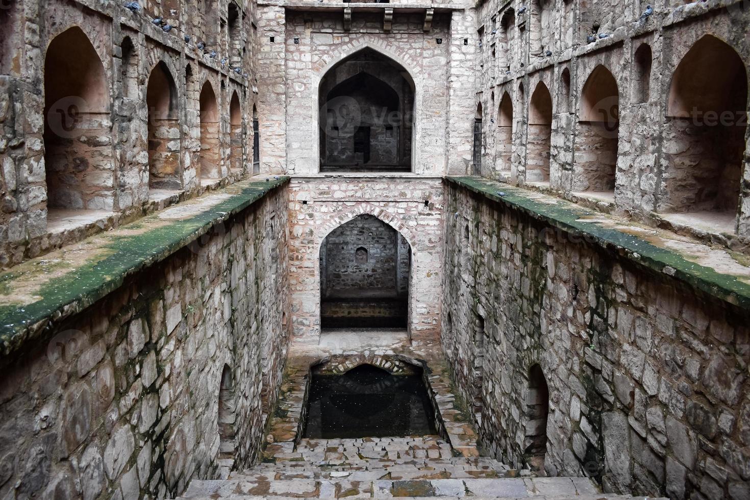 Agrasen Ki Baoli Step Well situated in the middle of Connaught placed New Delhi India, Old Ancient archaeology Construction photo