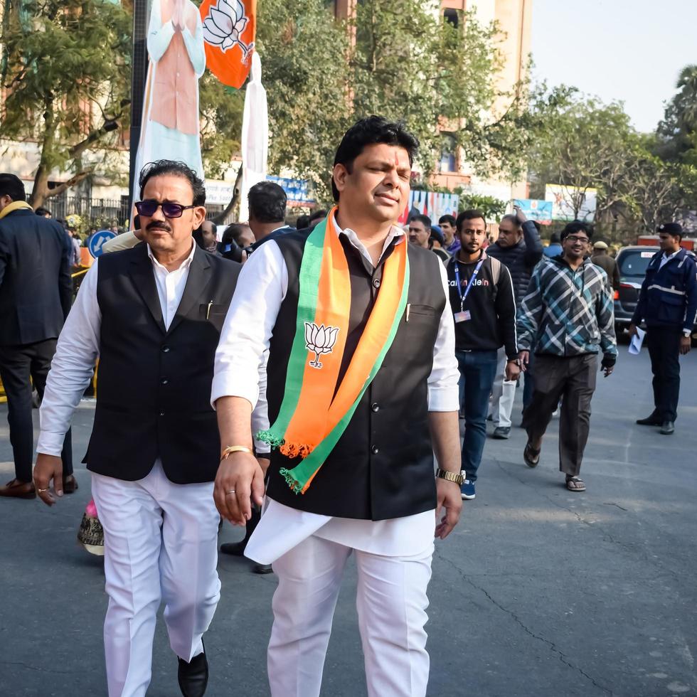 New Delhi, India - January 16 2023 - Thousands of people collected during Prime Minister Narendra Modi BJP road show, people during PM Modi big election rally in the capital photo