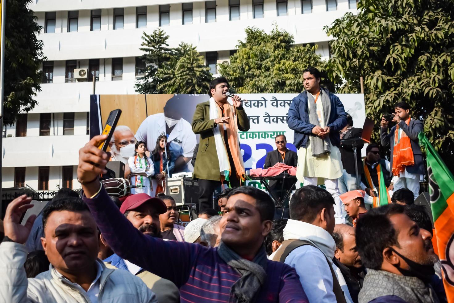 New Delhi, India - January 16 2023 - Thousands of people collected during Prime Minister Narendra Modi BJP road show, people during PM Modi big election rally in the capital photo