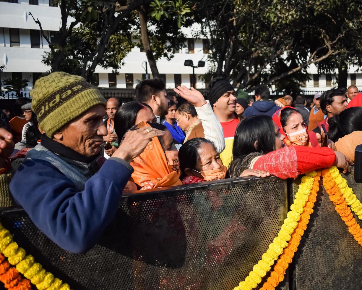 New Delhi, India - January 16 2023 - Thousands of people collected during Prime Minister Narendra Modi BJP road show, people during PM Modi big election rally in the capital photo
