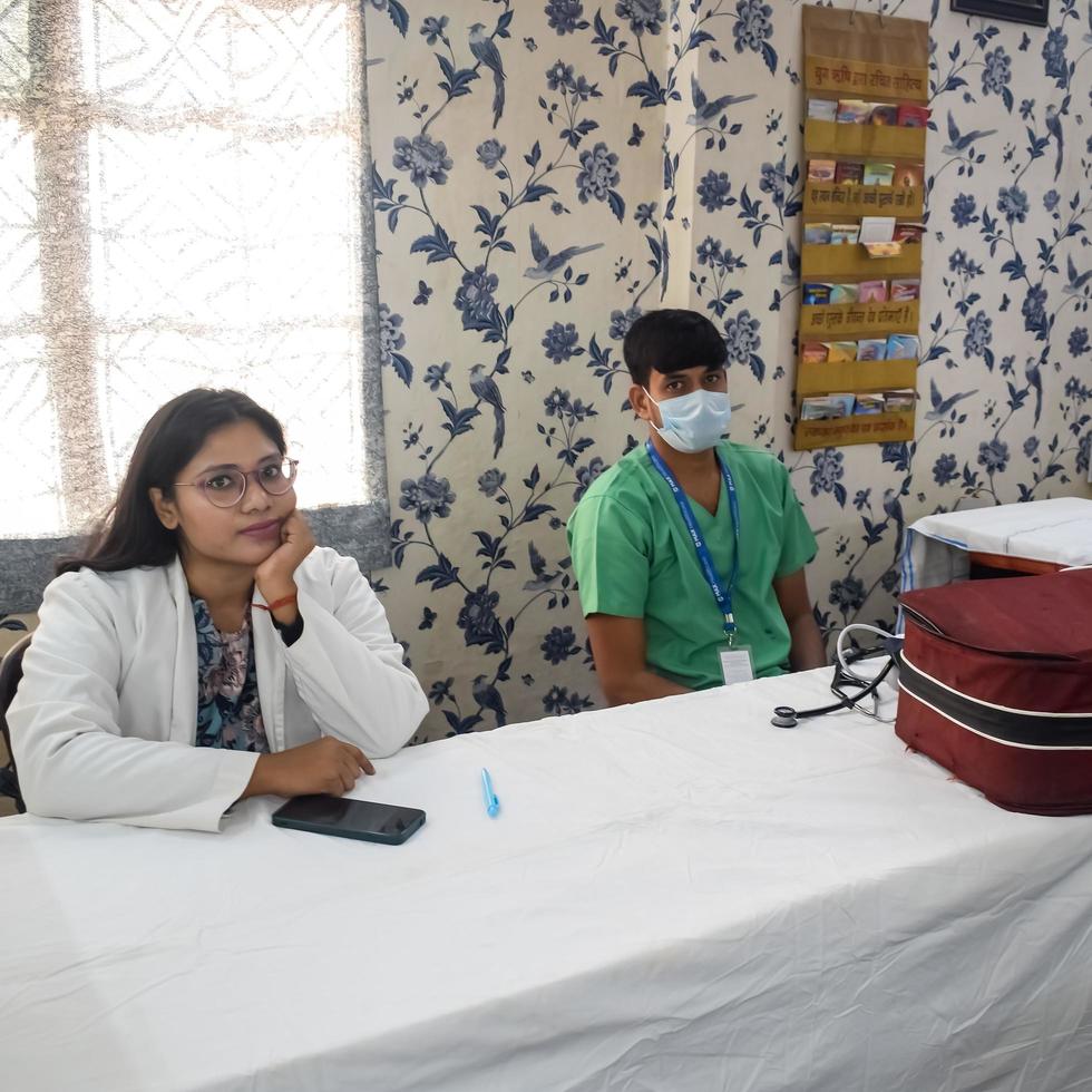 Delhi, India - November 19, 2022 - Basic routine health check-up camp has been organized by max hospital specialized doctors, Patient at annual health check-up, Doctor doing health check-up to patient photo