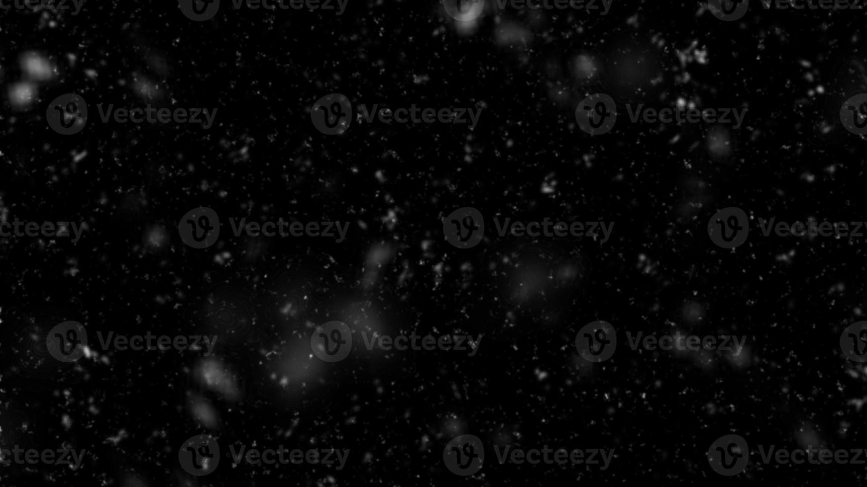 Flying rain or snow on black background. Falling snow down On the black background. Falling down real snowflakes, heavy snow, snowstorm weather photo