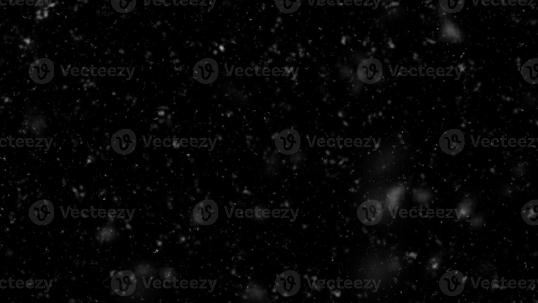Flying rain or snow on black background. Falling snow down On the black background. Falling down real snowflakes, heavy snow, snowstorm weather photo