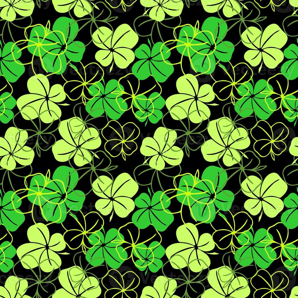 seamless pattern of green contours and silhouettes of a four-leaf clover on a black background, texture design photo