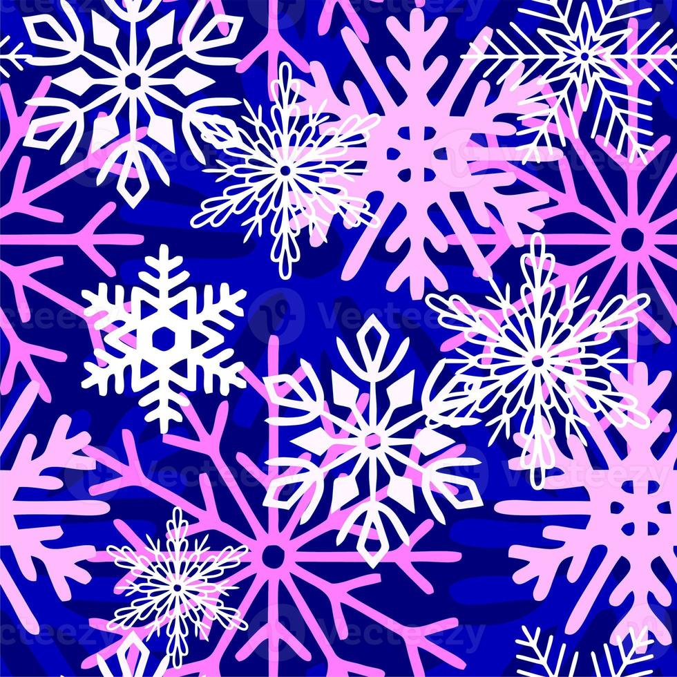 seamless asymmetric pattern of multicolored snowflakes on a blue background, texture, design photo