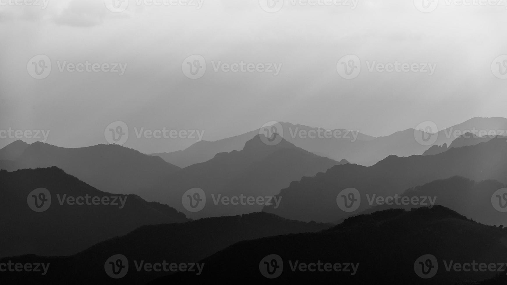 A sea of mountains in black and white photo