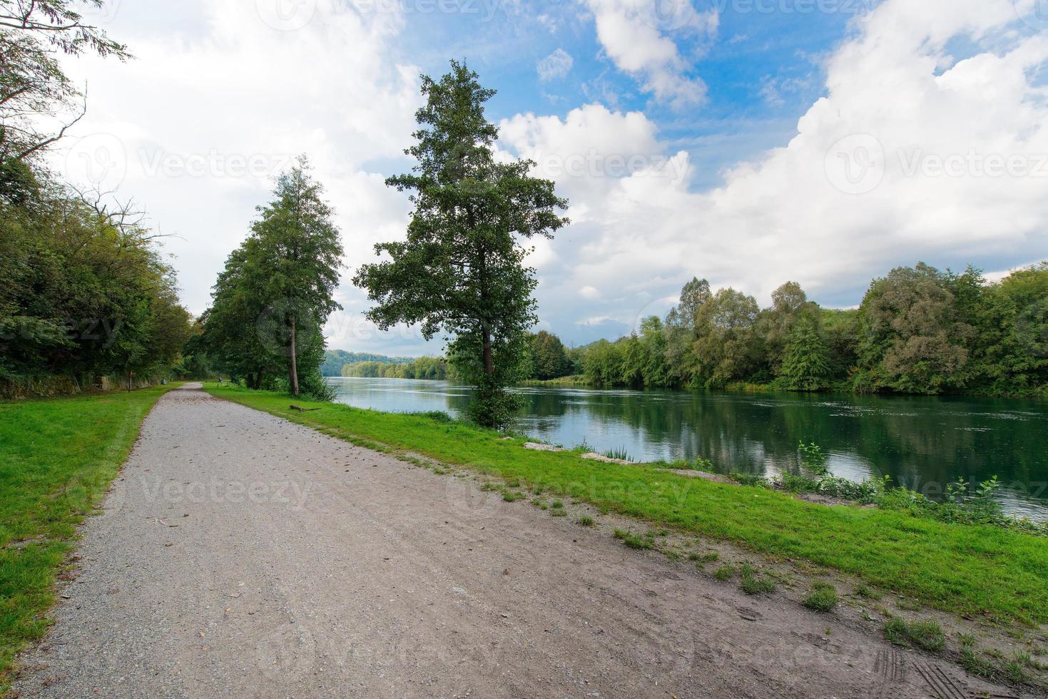 Bike path follows the river Adda photo