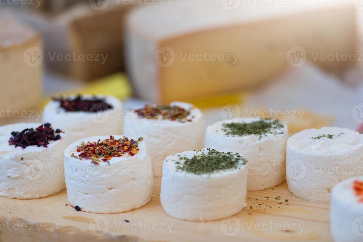 Traditional artisan goat cheese composition with spices and wild photo