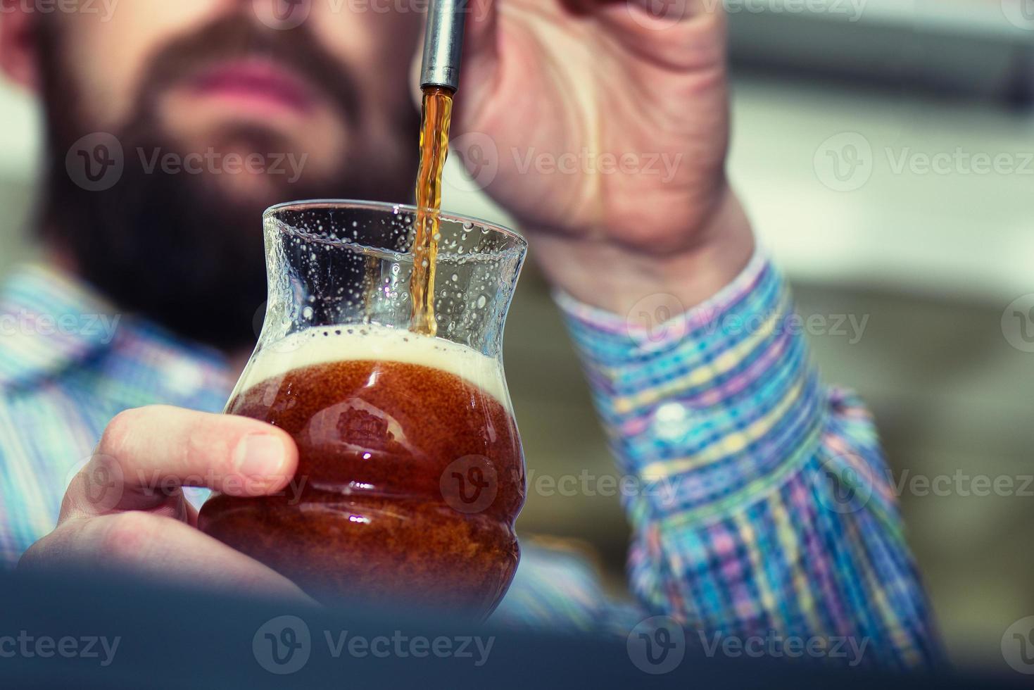 Dark beer on tap photo