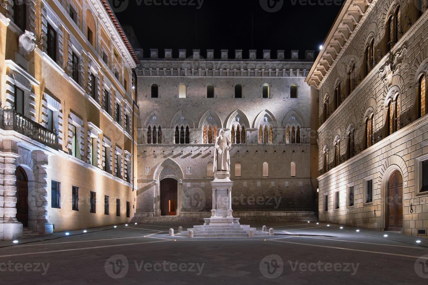 Salimbeni square in Siena. With the monument of Sallustio Bandini photo