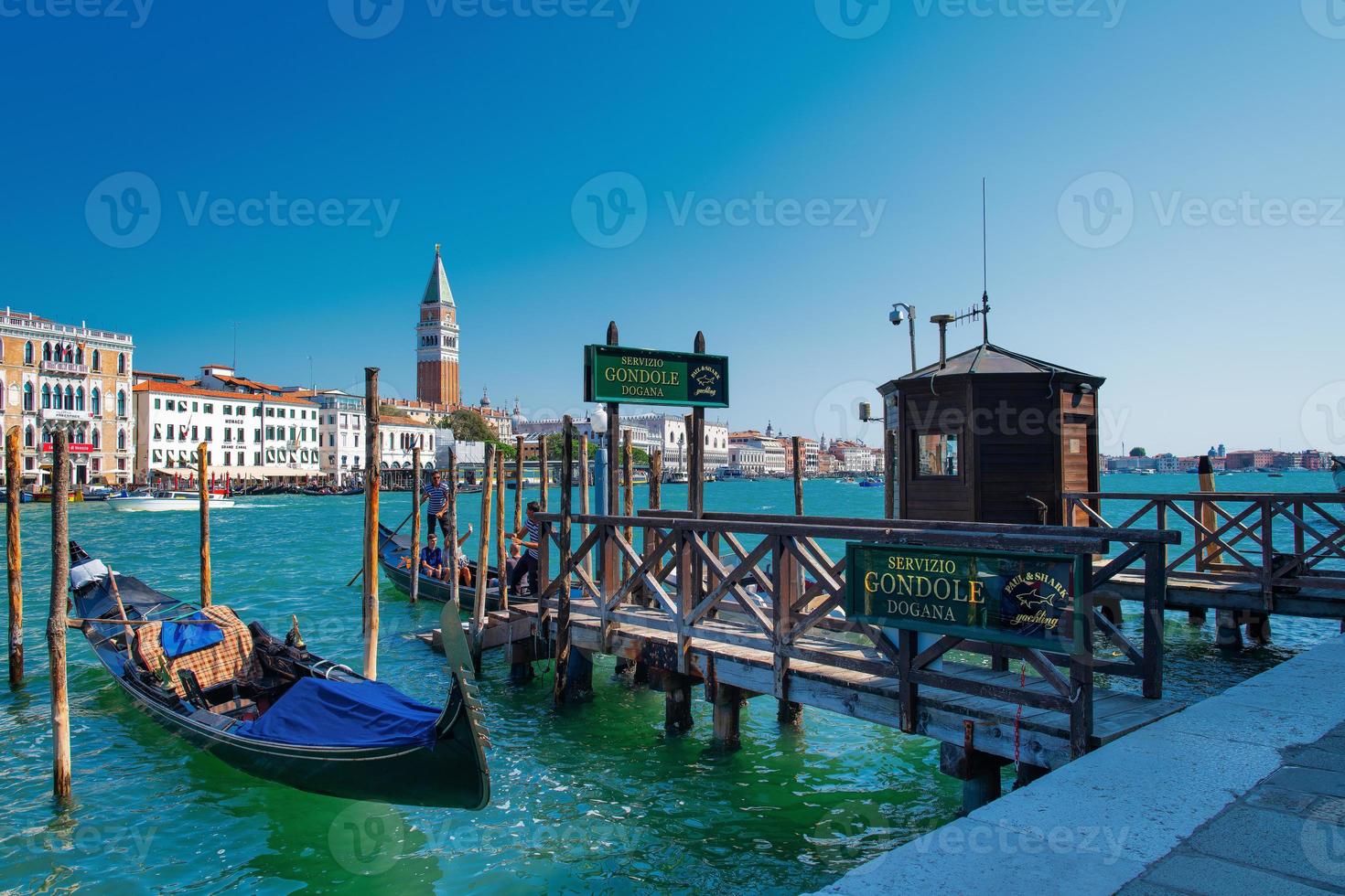 Tour departure by gondola in the Venice lagoon photo
