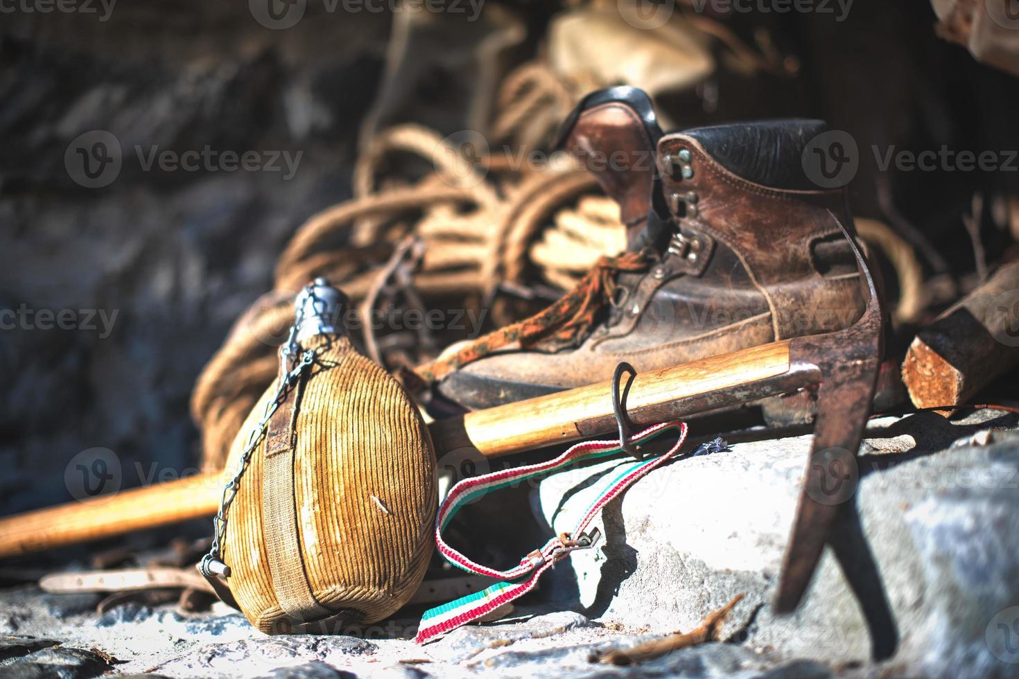 Old water bottle and ancient mountaineering material photo