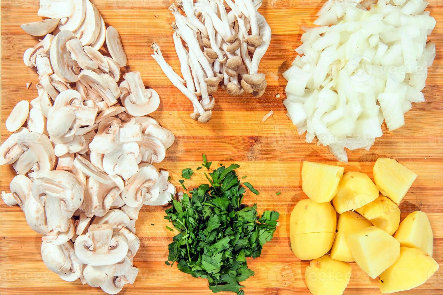 Raw ingredients. Ready to be cooked. Recipe for chiken stew, European cuisine, cooked with a garnish of mushrooms, small onions and ohter. photo