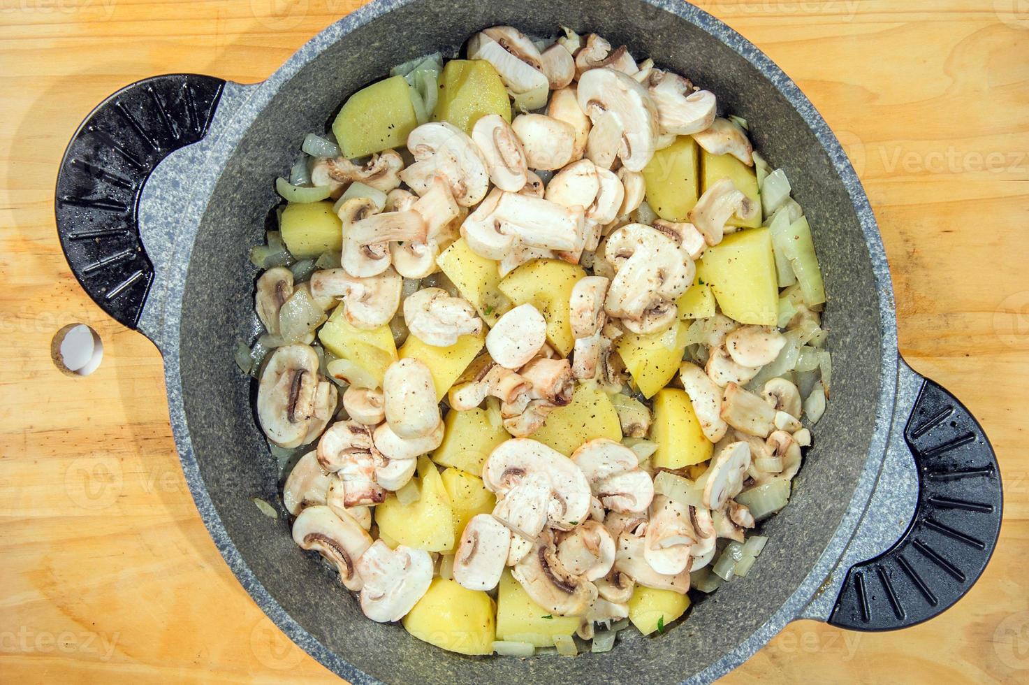 Raw ingredients. Ready to be cooked. Recipe for chiken stew, European cuisine, cooked with a garnish of mushrooms, small onions and ohter. photo