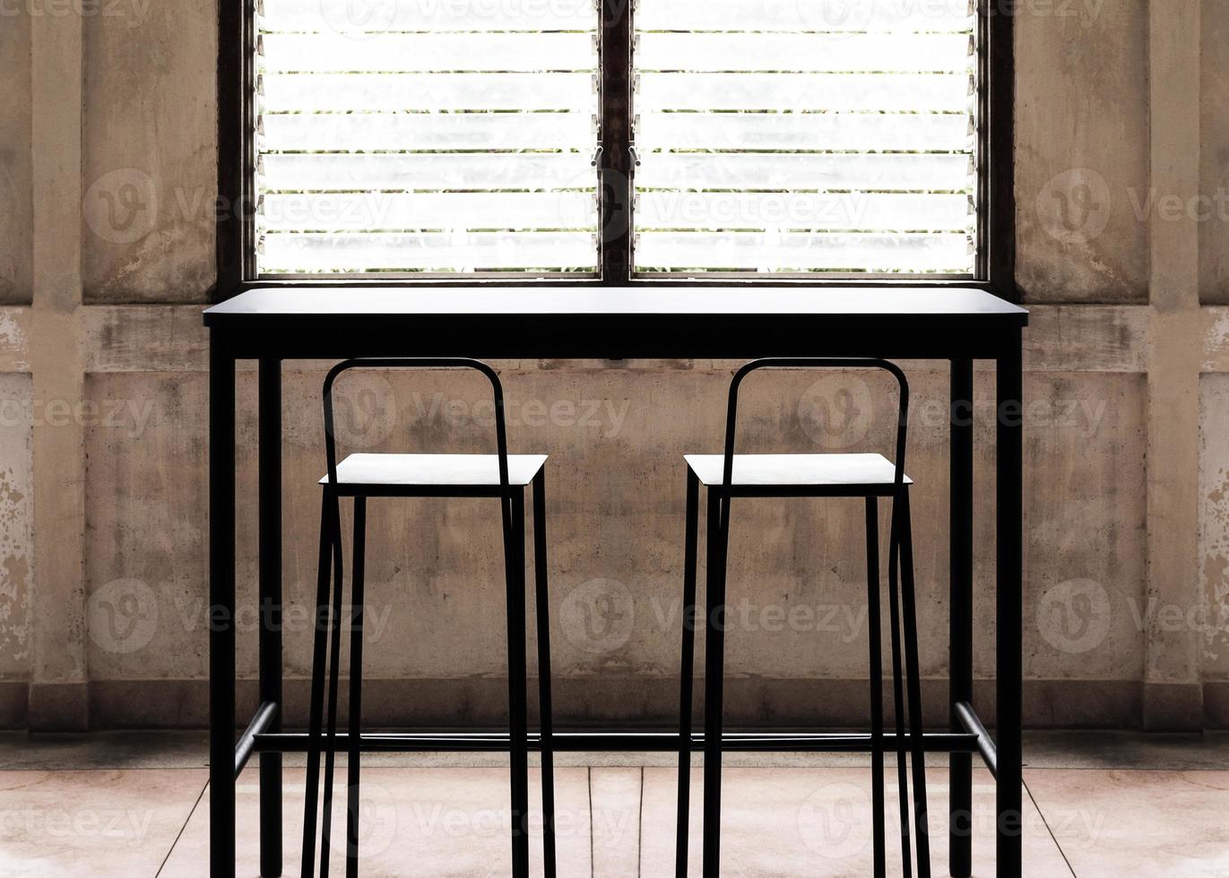 Black steel table bar and stool with louvre window photo