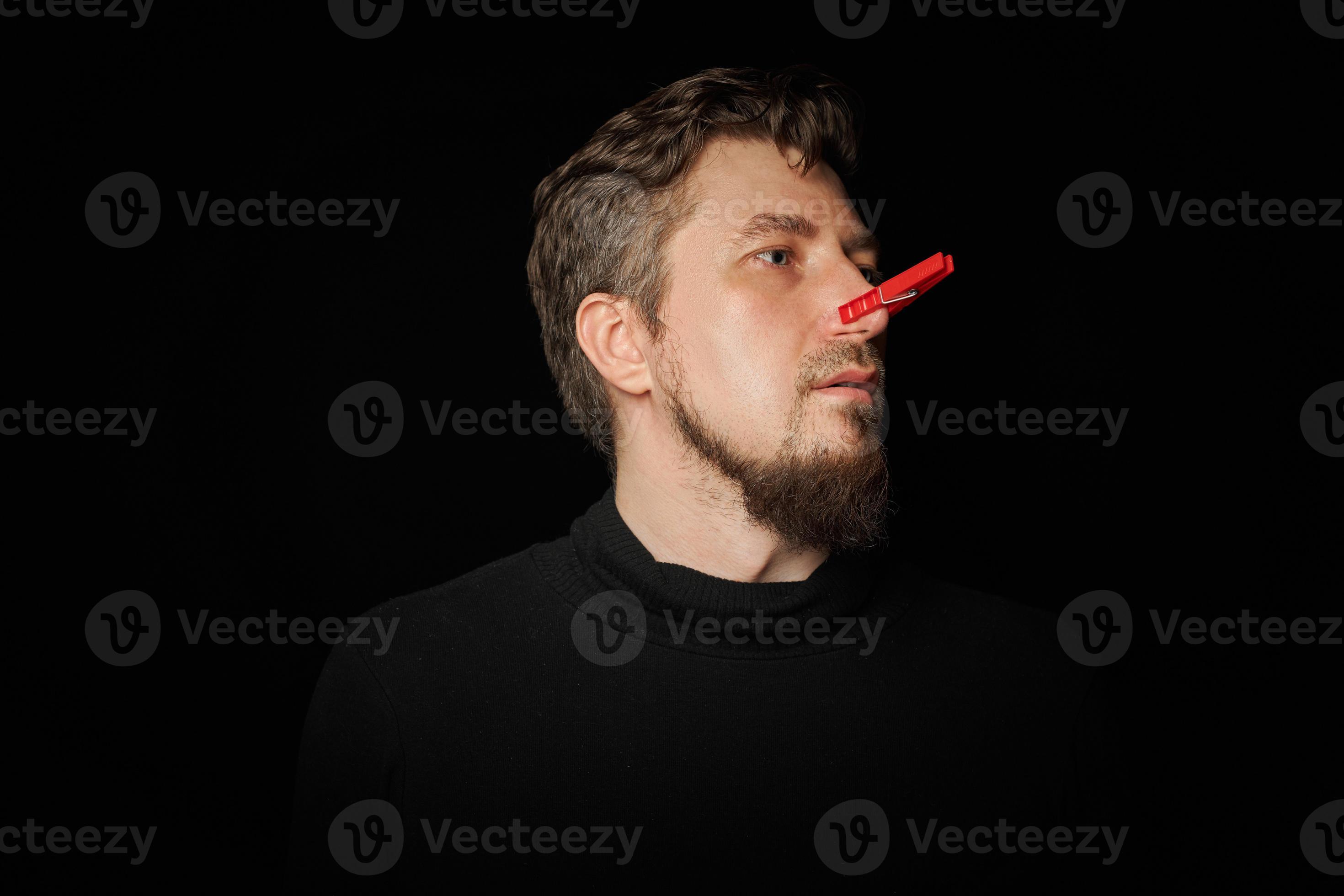 Bearded prankster with clothespin on nose. Funny joke concept. 18902491