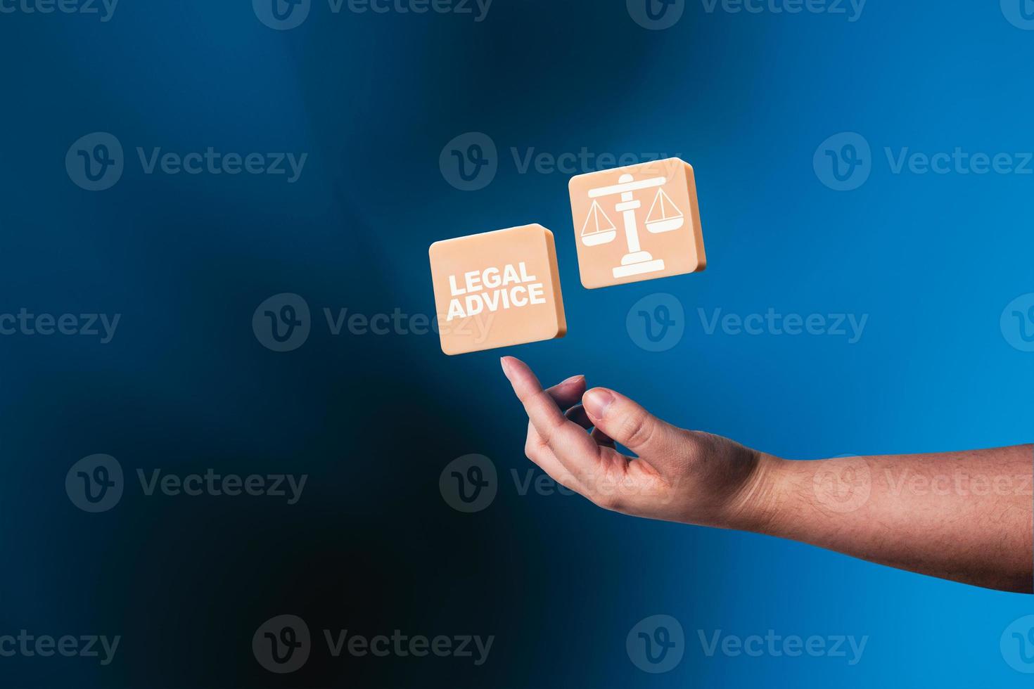Woman hand pointing balance justice icon with modern blue background. Legal advice technology service concept. Law and defense. photo