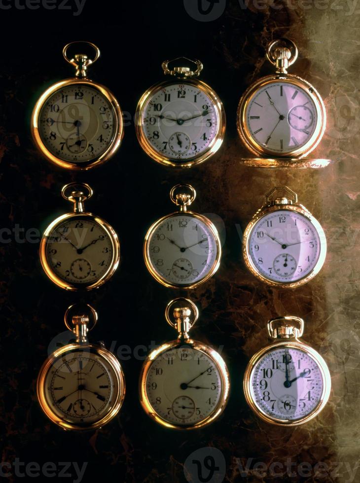 Nine gold watches photo