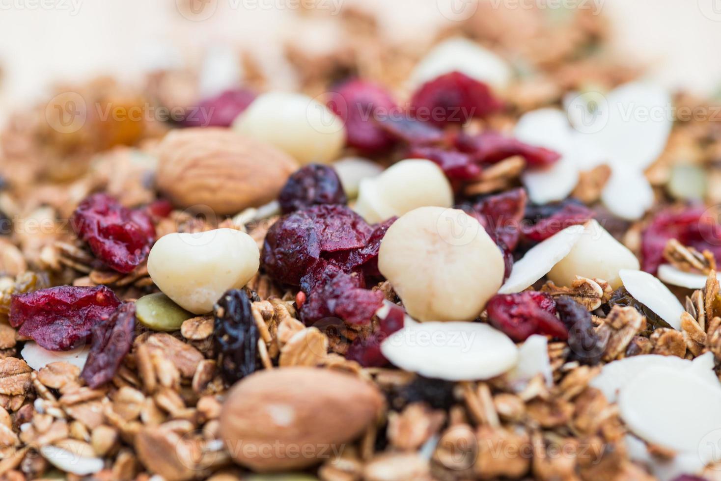 Closed up and blur breakfast healthy food, granola, musli, Organic oat, super food with honey, dried fruits and nuts photo