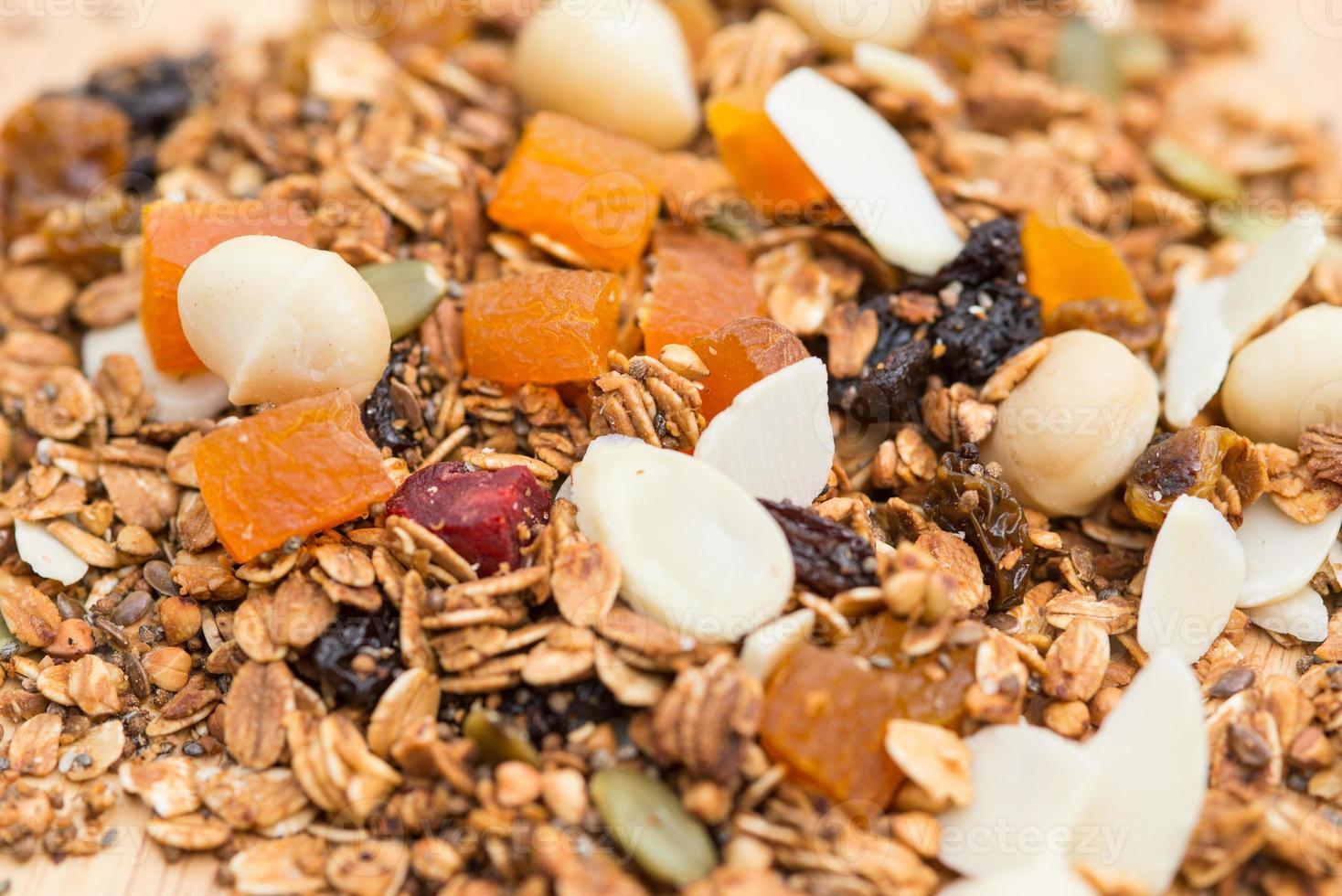 Closed up and blur breakfast healthy food, granola, musli, Organic oat, super food with honey, dried fruits and nuts photo