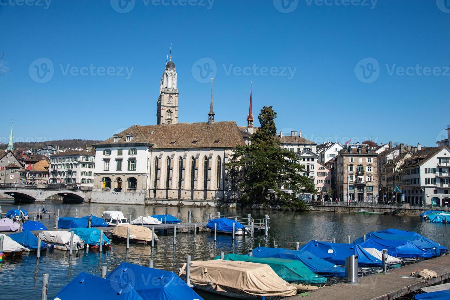 View of Linderholf the old town of Zurich on Limmat river and Frauenmunster Cathedral, Switzerland photo