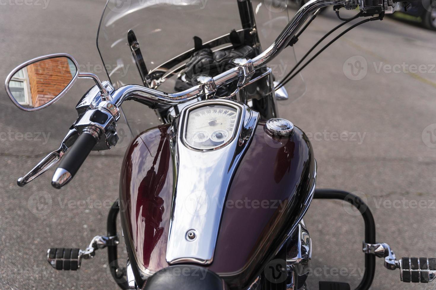 Beautiful top view of the motorcycle, motorcycle gas tank, motorcycle flatbar, shiny chrome, gas handle. photo