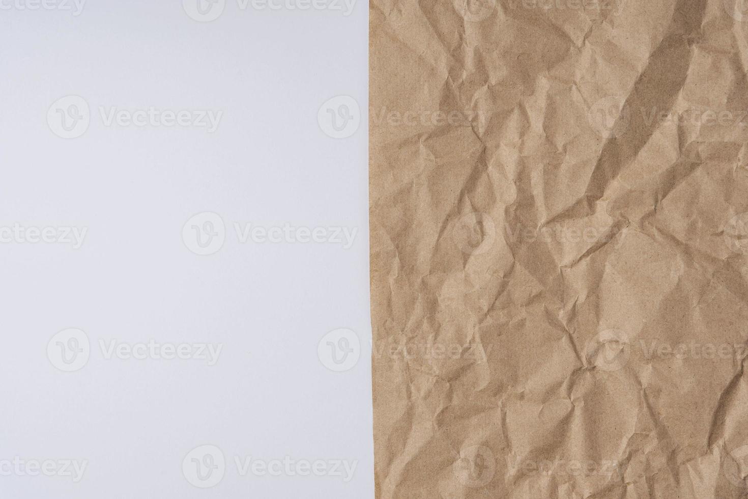 Background of crumpled wrapping paper and white space for copying text, beige rough sloppy creative background photo