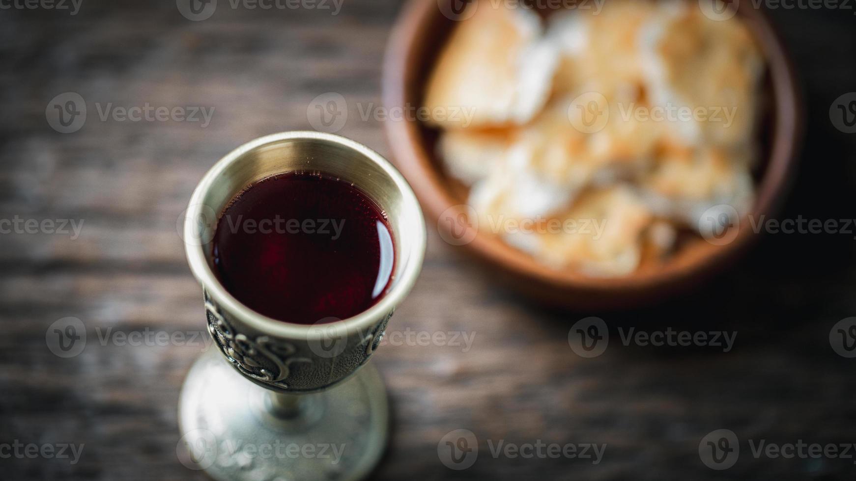 Concept of Eucharist or holy communion of Christianity. Eucharist is sacrament instituted by Jesus. during last supper with disciples. Bread and wine is body and blood of Jesus Christ of Christians. photo