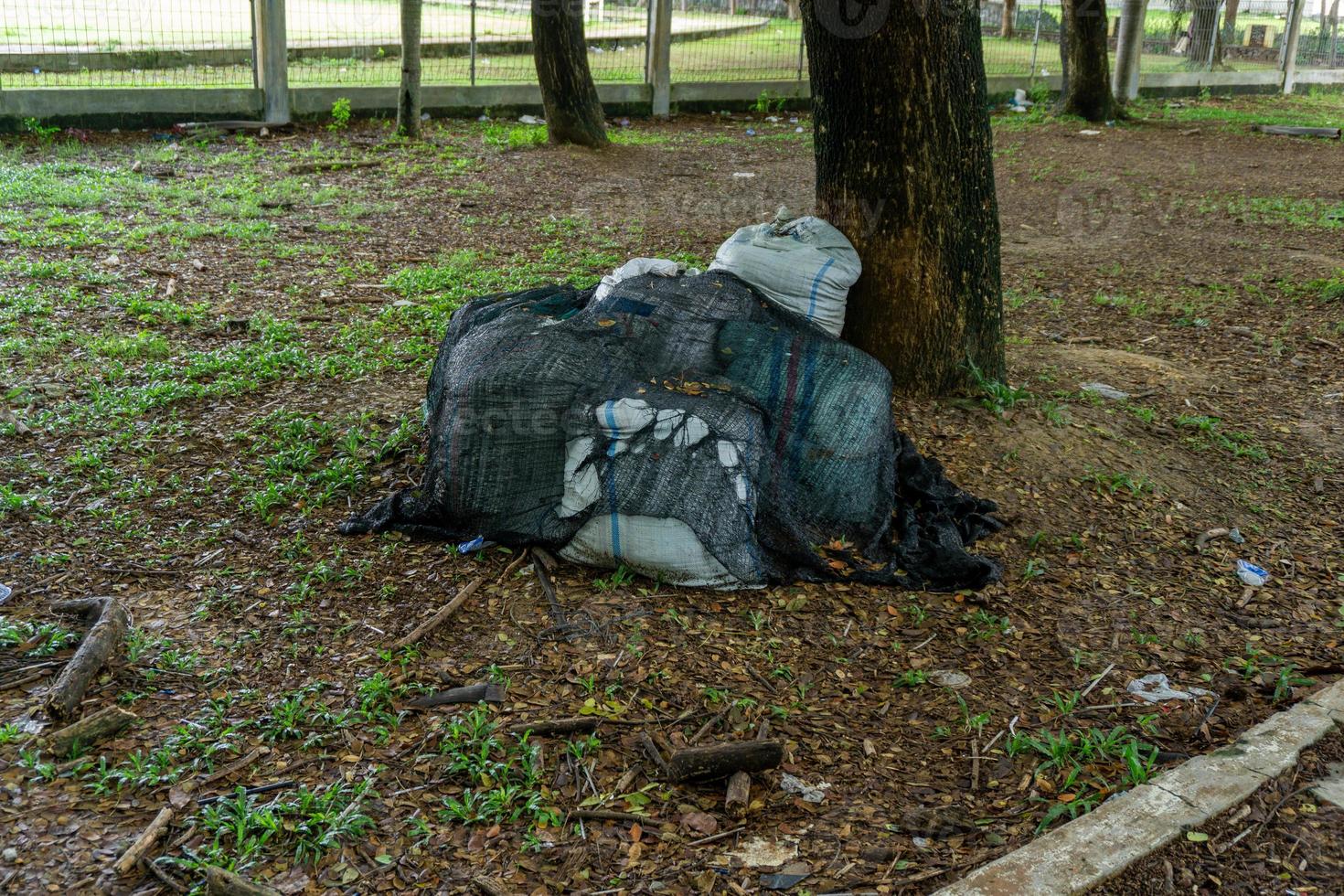 Pile of garbage in white bag. photo