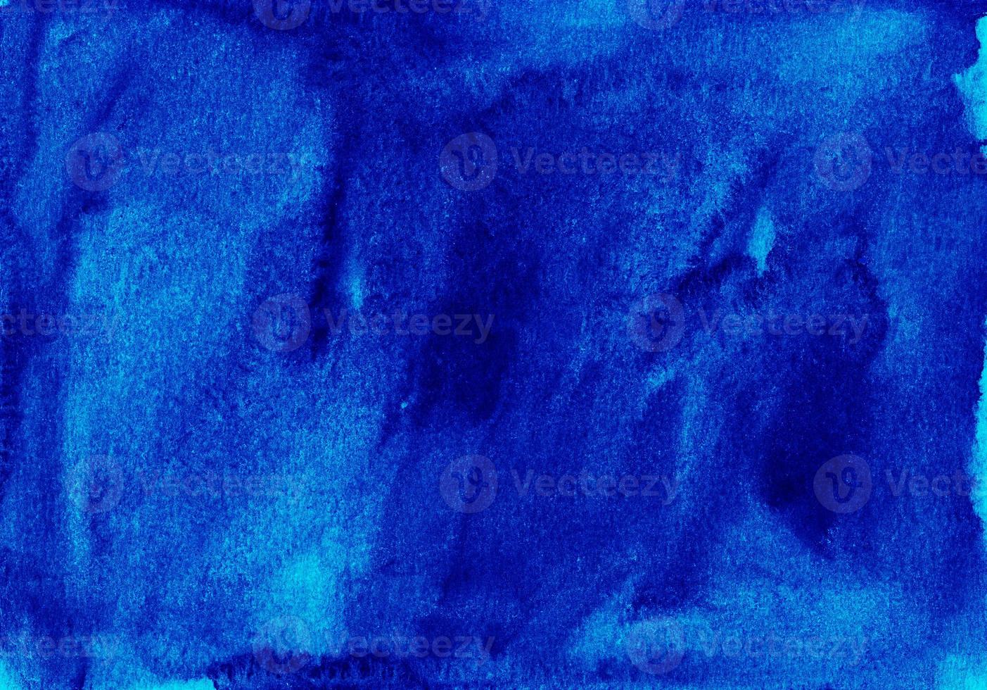 Watercolor liquid dark azure blue background painting texture. Vintage indigo blue color. Stains on paper. photo