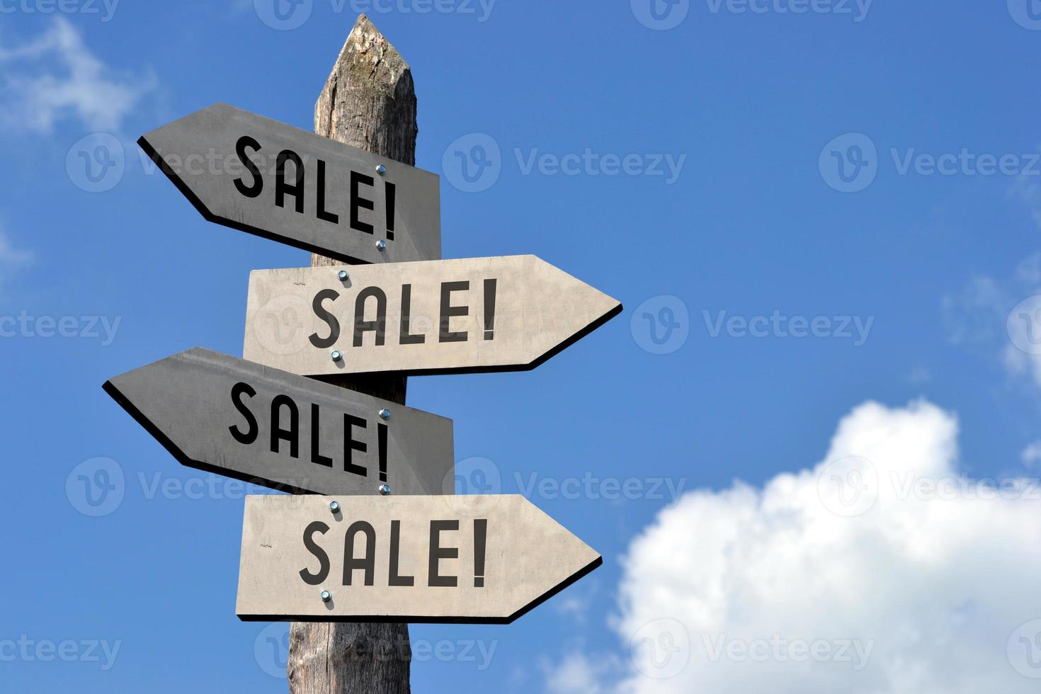 Sale - Wooden Signpost with Four Arrows photo