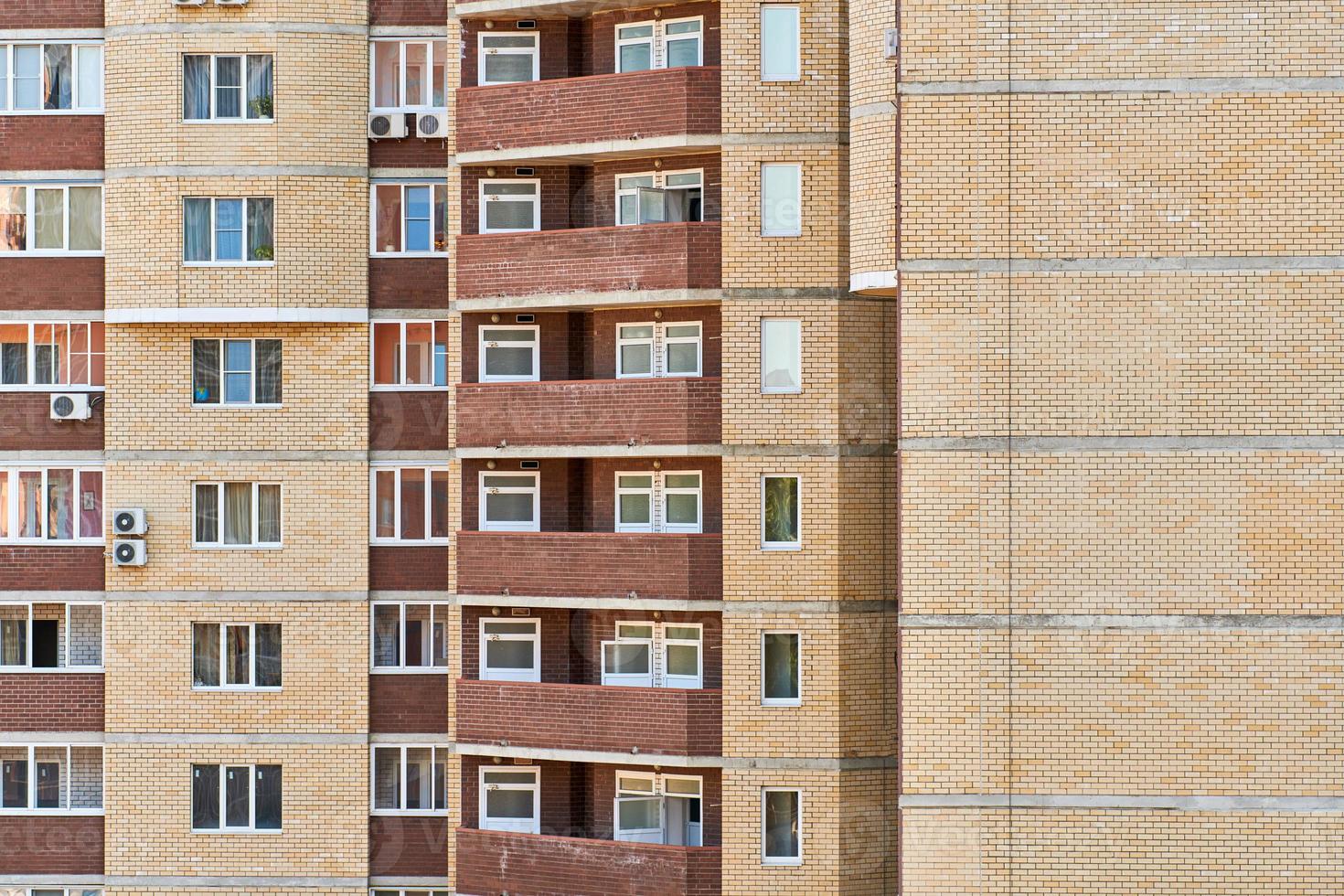 Multistorey building with new modern apartments photo