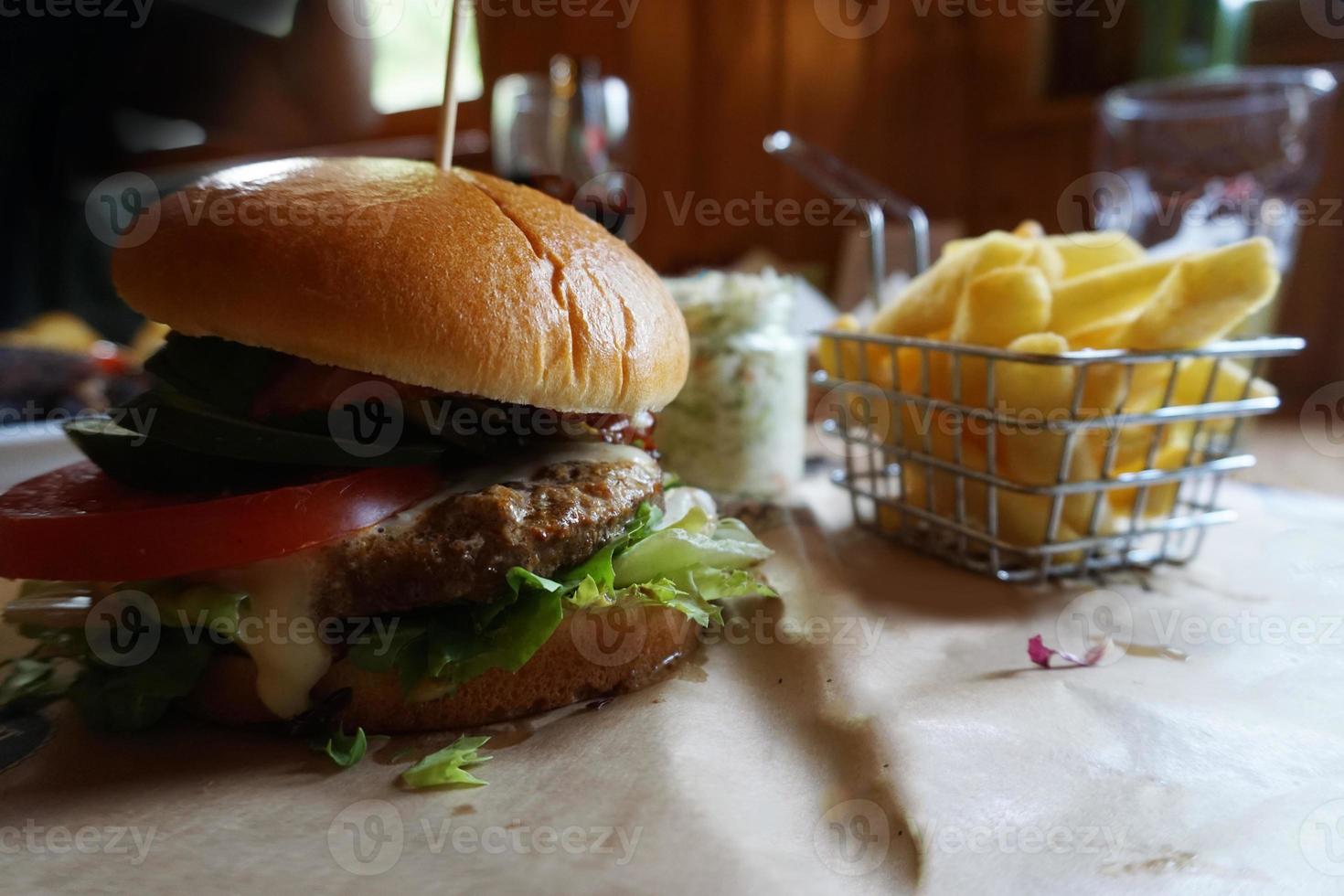 Burger and French Fries on Table photo