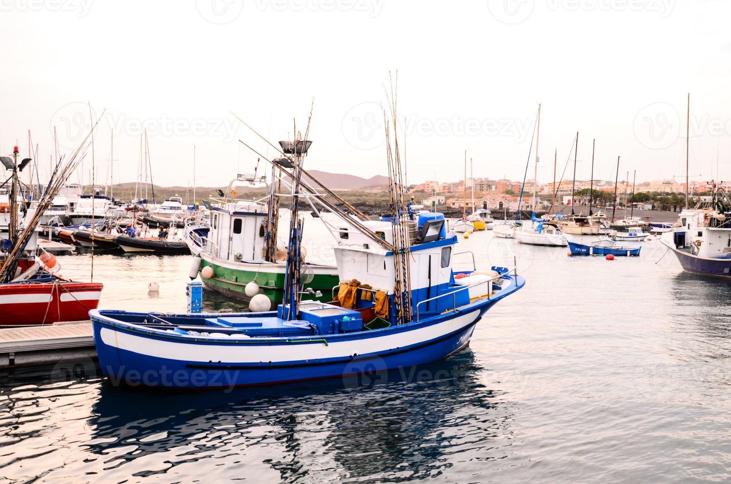 Boat on the harbor photo